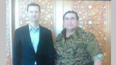 قائد ميليشيا صقور الصحراء في صورة سابقة مع الأسد