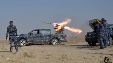 Federal police forces launch a rocket during clashes with ISIS militants in south of Mosul. (Reuters)