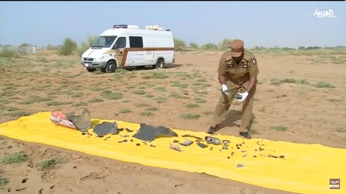 Parts of the intercepted missile reportedly launched by Houthi militias are laid down. (Al Arabiya)