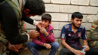Iraqi villagers escape ISIS snipers, leave family behind