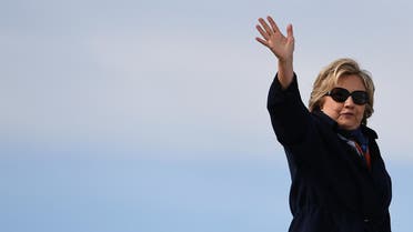 US Democratic presidential nominee Hillary Clinton waves as she boards her campaign plane at the Westchester County Airport in White Plains, New York, on October 29, 2016. Clinton embarks this weekend on the frenetic final 10 days of her White House campaign, determined to shake off renewed controversy over the FBI probe into her private emails. The 69-year-old Democrat -- vying to become America's first female president -- is still the frontrunner to win the November 8 election over her Republican rival Donald Trump. (AFP)