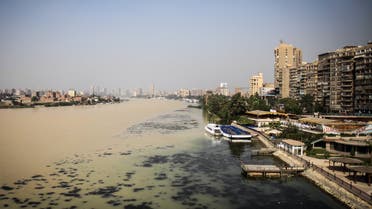 A picture taken on October 31, 2016 in Cairo shows yellow-brown water in a section of the Nile River caused by excess silt from recent floods in the southern Egyptian provinces. AFP
