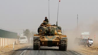 Abadi warns Turkey as Ankara deploys troops