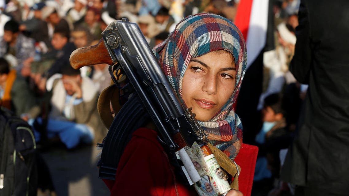 A girl carries a rifle as she attends a rally by followers of the Shi'ite Houthi movement commemorating the death of Imam Zaid bin Ali in Sanaa, Yemen October 26, 2016. REUTERS