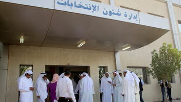 Kuwaitis wait in front of the election affairs department as Kuwaiti candidates arrive to register for the upcoming parliamentary election in Kuwait City, on October 19, 2016. (File photo: AFP)
