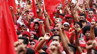 Malaysia’s ‘Red Shirts’ protest against media group over funding claims
