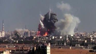 This frame grab from video provided by this militant video by Fatah al-Sham Front that is consistent with independent AP reporting, shows flames and smoke rise from a suicide bomb attacked Syrian government forces positions, in western Aleppo, Syria, Thursday, Nov. 3, 2016. The Britain-based Syrian Observatory for Human Rights, which monitors the conflict through local contacts, reported that rebels attacked government positions with two explosives-laden vehicles. Syrian rebels launched a fresh wave of attacks on western districts of Aleppo Thursday as airstrikes on a rebel-held village south of the contested city killed civilians, activists said. (militant video by Fatah al-Sham Front, via AP)