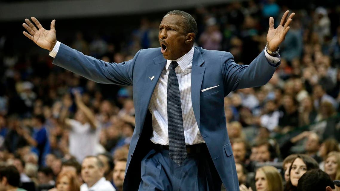 Toronto Raptors head coach Dwane Casey shouts in frustration as his team is charged with a foul during an NBA basketball game against the Dallas Mavericks, Friday, Dec. 20, 2013, in Dallas. The Raptors won in overtime 109-108. (AP Photo/Tony Gutierrez)
