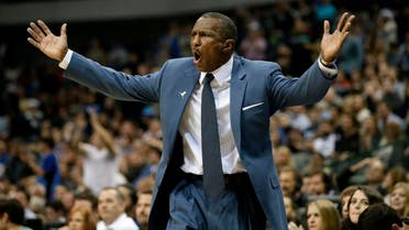 Toronto Raptors head coach Dwane Casey shouts in frustration as his team is charged with a foul during an NBA basketball game against the Dallas Mavericks, Friday, Dec. 20, 2013, in Dallas. The Raptors won in overtime 109-108. (AP Photo/Tony Gutierrez)
