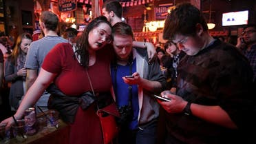 Supporters of US Democratic presidential candidate Hillary Clinton watch televised coverage of the US presidential election at Comet Tavern in the Capitol Hill neighborhood of Seattle, Washington, on November 8, 2016. Jason Redmond / AFP