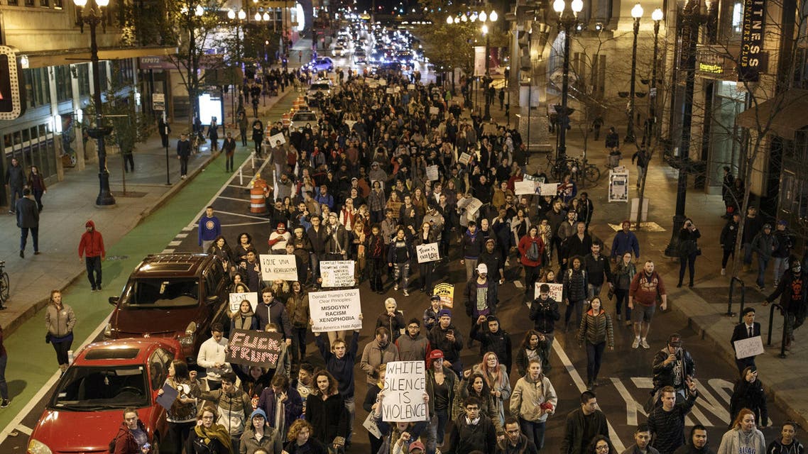 Anti-Trump demonstrators protest on November 9, 2016 in Chicago, Illinois. (AFP)