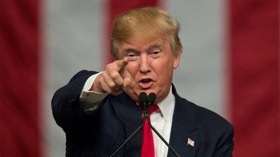 (FILES) This file photo taken on February 19, 2016 shows Republican presidential candidate Donald Trump speaks during a campaign rally in North Charleston, South Carolina. Donald Trump assumes the mantle of the US presidency under an unprecedented cloud of litigation that could weigh on his ability to govern after this week's shock election. Just as the newly minted president-elect visited the White House and Capitol Hill on November 10, 2016, t