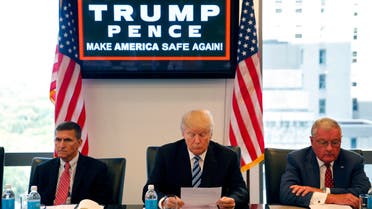 In this Aug. 17, 2016, file photo, then-Republican presidential candidate Donald Trump participates in a roundtable discussion on national security in his offices in Trump Tower in New York, with Ret. Army Gen. Mike Flynn, left, Ret. Army Lt. Gen. Keith Kellogg. (AP)