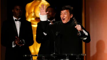 Actor Jackie Chan reacts as he accepts his Honorary Award as actor Chris Tucker (C) looks on at the 8th Annual Governors Awards in Los Angeles, California, U.S., November 12, 2016. REUTERS