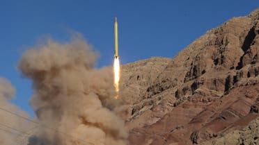 A long-range Qadr ballistic missile is launched in the Alborz mountain range in northern Iran on March 9, 2016. Iran said its armed forces had fired two more ballistic missiles as it continued tests in defiance of US warnings.  Mahmood Hosseini / TASNIM NEWS / AFP
