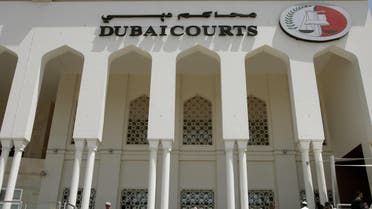 A closeup shot shows the facade of the Dubai Courts building during a hearing on April 04, 2010 in the case of a British couple sentenced to a month in jail after being convicted of kissing in public in a restaurant in the Muslim Gulf emirate. The couple's lawyer said the appeals court upheld the one-month prison sentence against the two, named by the British press as Ayman Najafi, 24, a British expat, and tourist Charlotte Lewis, 25. The couple were arrested in November 2009, after they were accused of consuming alcohol and kissing in a restaurant in the trendy Jumeirah Beach Residence neighbourhood. AFP PHOTO/STR