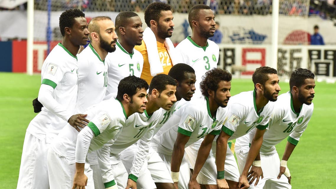 Saudi Arabia's starting players pose during a photo session prior to their football match in Group B of the 2018 World Cup Asian qualifier against Japan at Saitama Stadium in Saitama on November 15, 2016. KAZUHIRO NOGI / AFP