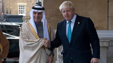 Saudi Arabia's Foreign Minister Adel al-Jubeir, left, is greeted by British Foreign Secretary Boris Johnson ahead of a meeting on the situation in Syria, at Lancaster House in London, Sunday Oct. 16, 2016. Renewed international efforts to solve the conflict in Syria, heightened by the plight of people in the city of Aleppo, have made little progress but more talks are planned. ( JUSTIN TALLIS / Pool via AP)