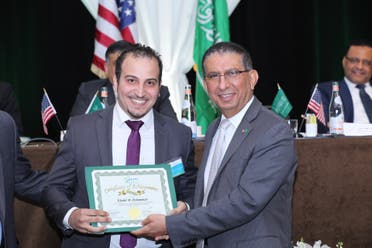 Saudi student Khalid al-Qhes al-Shammeri awarded by his university for his Saudi club’s efforts. (Supplied)