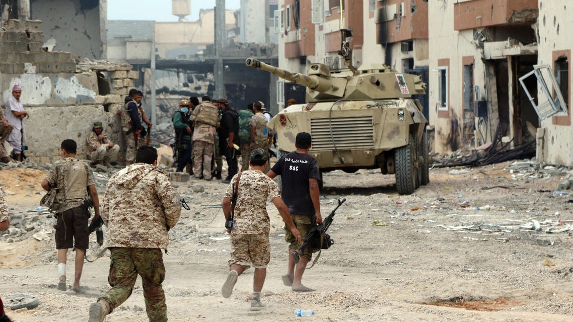 Forces loyal to Libya's Government of National Accord (GNA) hold a position in Sirte's Al-Giza Al-Bahriya district on November 21, 2016, during clashes with Islamic State (IS) group jihadists to retake control of the Mediterranean coastal city.