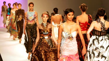 Models present creation by Nili Zahar from Kuwait during Dubai Fashion Week which started yesterday in Dubai, United Arab Emirates, Monday, Oct. 6, 2008. (AP
