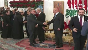 Watch: Saad Hariri refuses to shake hands with Syrian ambassador