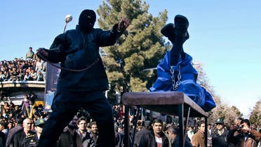 n Iranian officer lashes a man, convicted of rape, at the northeastern city of Sabzevar, Iran, Wednesday, Jan. 16, 2013.  AP