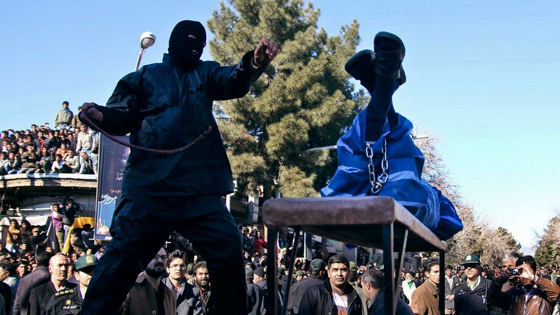 n Iranian officer lashes a man, convicted of rape, at the northeastern city of Sabzevar, Iran, Wednesday, Jan. 16, 2013. AP