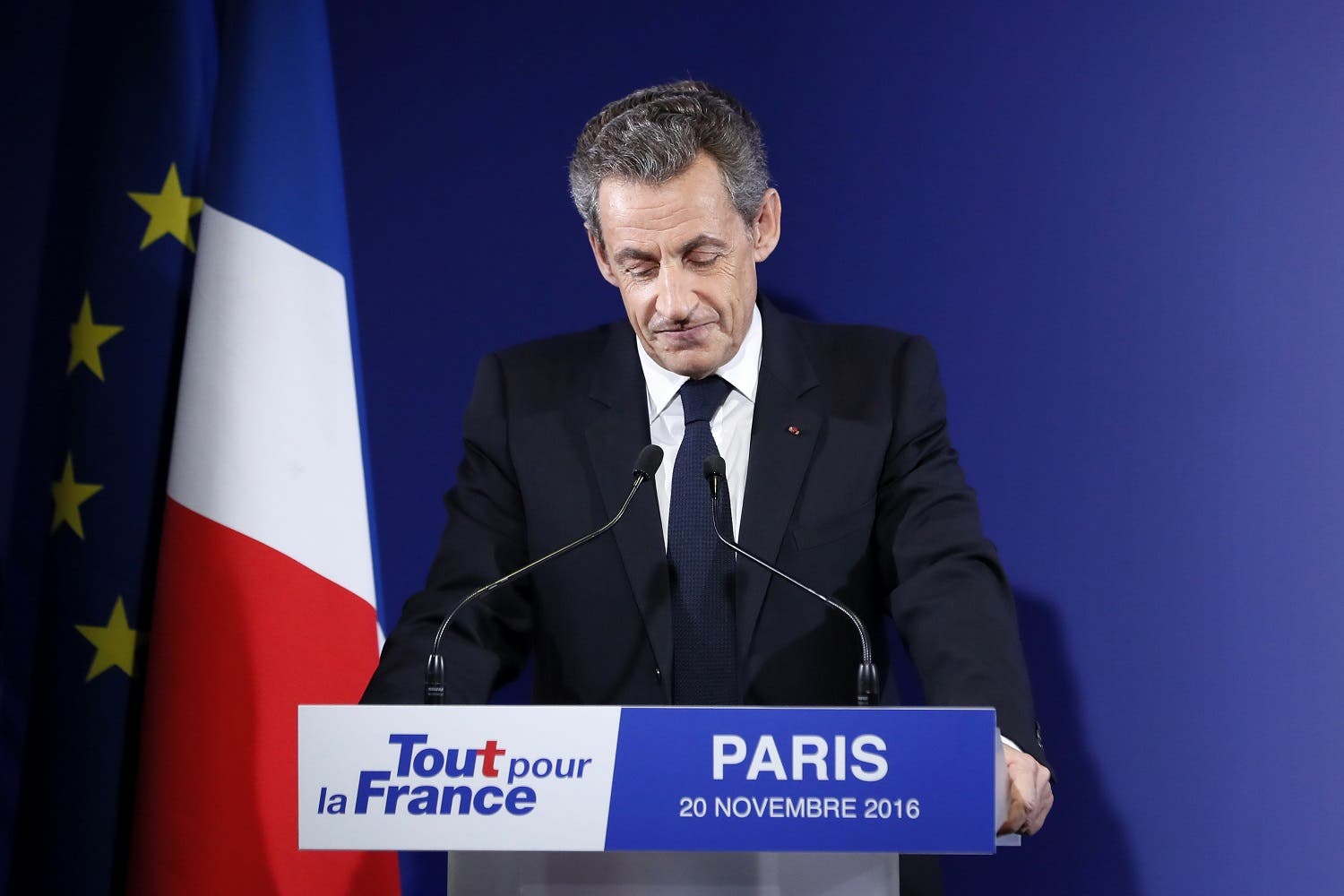 Former French President Nicolas Sarkozy delivers a speech after being defeated on the first round of the French right wing party 'Les Republicains' primaries in Paris, France, Sunday, Nov. 20, 2016. Former French prime minister Francois Fillon had the largest share of votes in early returns Sunday from the first round of the conservative primary for next year's presidential election. (Ian Langsdon/Pool Photo via AP)