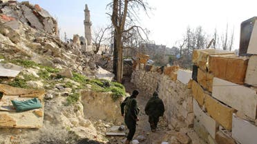 Rebel fighters of the Jabha Shamiya walk within the compound of the justice palace in the old city of Aleppo, Syria January 28, 2016. REUTERS/Abdalrhman Ismail/File Photo