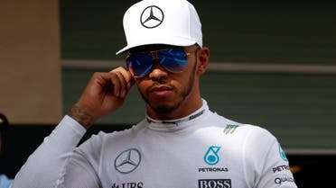 Formula One - F1 - Abu Dhabi Grand Prix - Yas Marina Circuit, Abu Dhabi, United Arab Emirates - 25112016 - Mercedes' driver Lewis Hamilton of Britain leaves at the end of the first practice session. REUTERS
