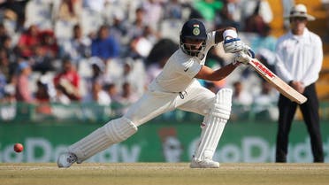 India's Virat Kohli plays a shot against England on the second day of the third test in Mohali, India. (Reuters)