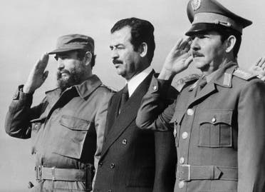 This handout photo taken and released by Prensa Latina on January 30, 1979 in Havana, shows Iraqi vice-president Saddam Hussein (C) standing during his visit to Cuba with Cuban President Fidel Castro (L) and Defense minister General Raul Castro. (AFP)