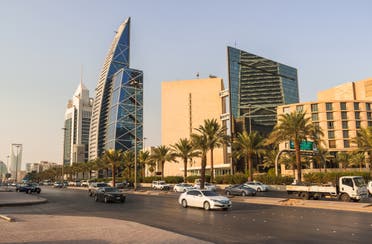 King Fahd's street road in Riyadh in daylight with skyscrapers and other buildings on the back Shutterstock Saudi Arabia 