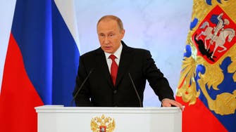 Putin curbs anti-Western rhetoric, says wants to get on with Trump