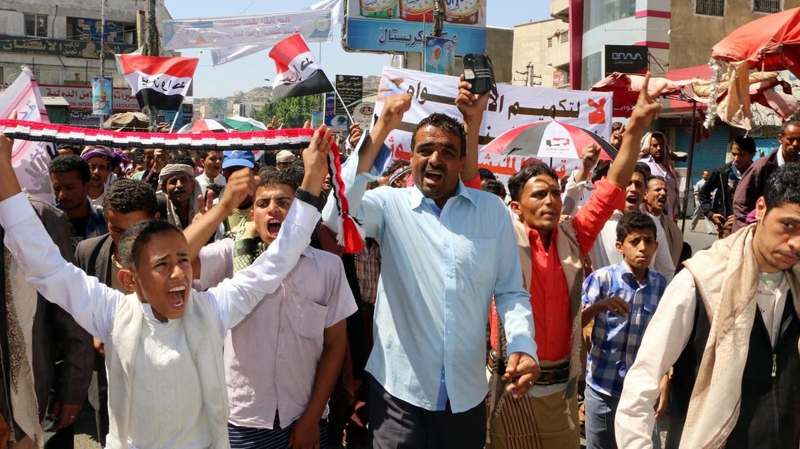 Yemenis take part in a demonstration following the Friday prayers in the second largest city of Taiz last year against Houthi militias. (AFP)