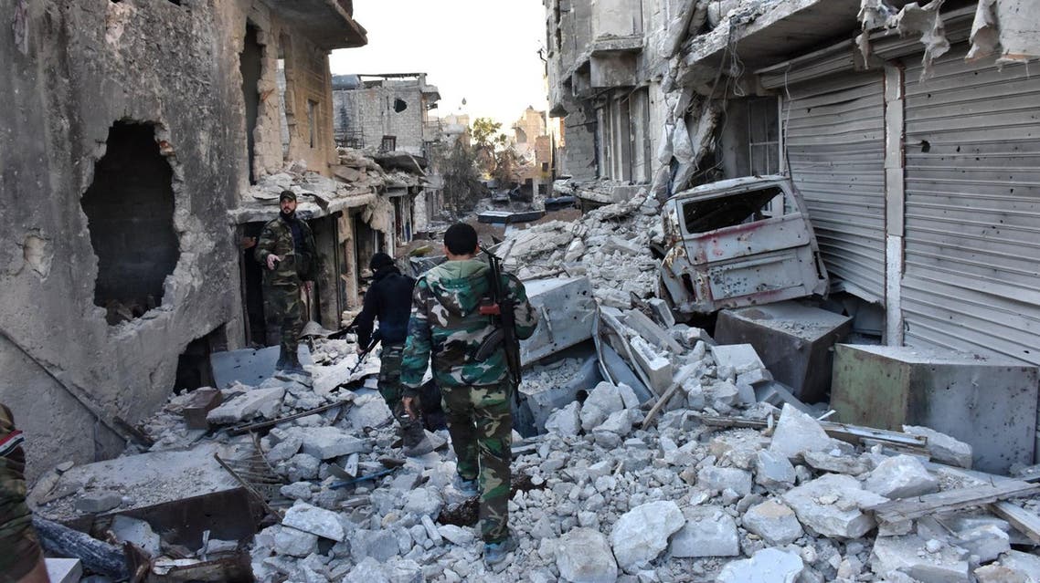 A Syrian woman is carried as families, fleeing from various eastern districts of Aleppo, wait to board vehicles and head to government-controlled western Aleppo on November 29, 2016 in the government-held eastern neighbourhood of Jabal Badro, as the Syrian government offensive to recapture rebel-held Aleppo has prompted an exodus of civilians. The Syrian government offensive to recapture rebel-held Aleppo sparked international alarm, with the UN saying nearly 16,000 people had fled the assault and more could follow. The fighting has prompted an exodus of terrified civilians, many fleeing empty-handed into remaining rebel-held territory, or crossing into government-controlled western Aleppo or Kurdish districts. George OURFALIAN / AFP