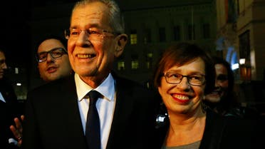 Austrian presidential candidate Alexander Van der Bellen (R) , who is supported by the Greens, and his wife Doris Schmidauer arrive for a TV show in Vienna, Austria, on December 4, 2016. (Reuters)