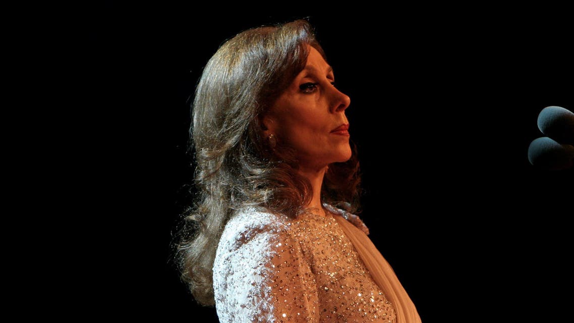 This picture released by the press office of Lebanese diva Fairuz, shows the diva performing during her concert at the ancient Odeon of Herodes Atticus late 07 July 2007 in the Greek capital Athens. Fairuz's soldout concert in the ancient amphitheatre by the Acropolis was attended by 5,000 people, some of whom flew in from neighbouring countries. AFP