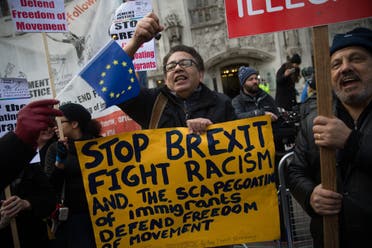 Anti-Brexit demonstrators protest outside the Supreme court building in London on the first day of a four-day hearing on December 5, 2016. The government of Prime Minister Theresa May will today seek to overturn a ruling that it must obtain parliamentary approval before triggering Brexit, in a highly-charged case in Britain's highest court. DANIEL LEAL-OLIVAS / AFP