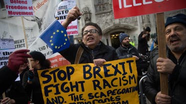 Anti-Brexit demonstrators protest outside the Supreme court building in London on the first day of a four-day hearing on December 5, 2016. The government of Prime Minister Theresa May will today seek to overturn a ruling that it must obtain parliamentary approval before triggering Brexit, in a highly-charged case in Britain's highest court. DANIEL LEAL-OLIVAS / AFP