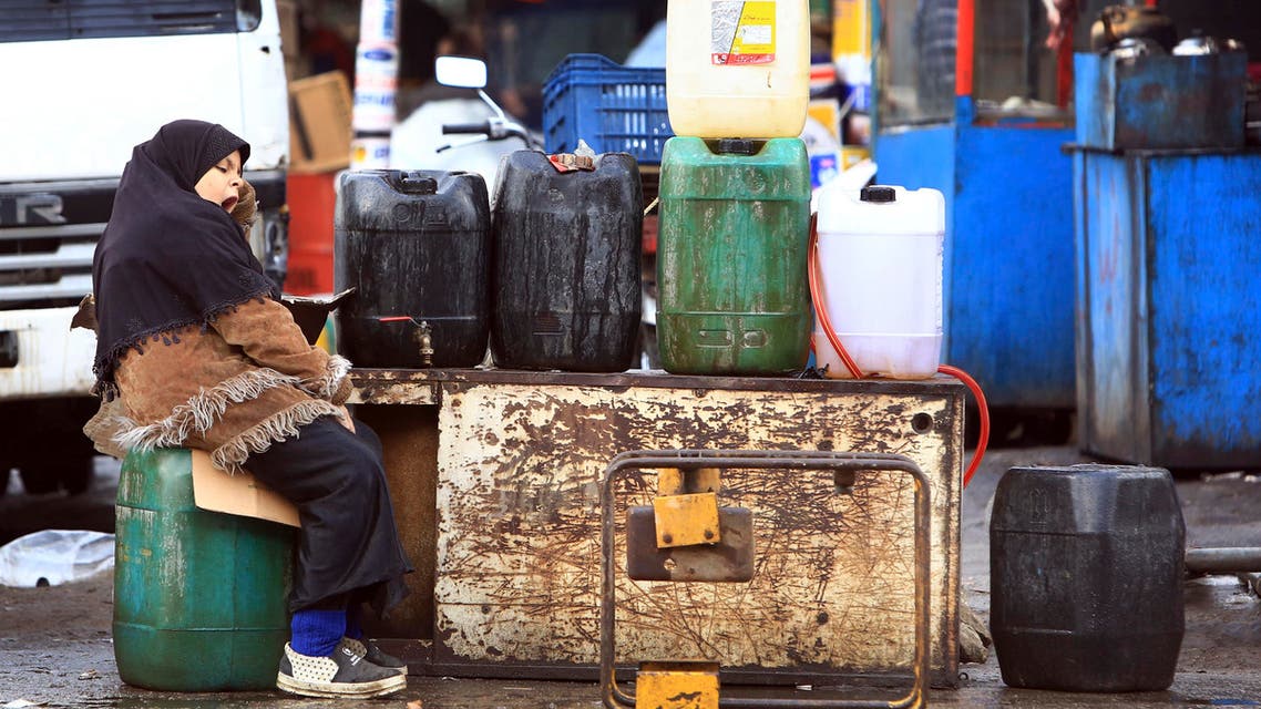 Fuel for sale on the sidewalk in Basra, 340 miles (550 kilometers) southeast of Baghdad, Iraq, Thursday, Dec. 1, 2016. AP