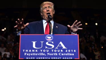 US President-elect Donald Trump speaks at the Crown Coliseum in Fayetteville, North Carolina on December 6, 2016 during his USA Thank You Tour. TIMOTHY A. CLARY / AFP
