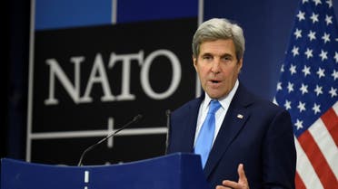 US Secretary of State John Kerry gestures as he give a press conference during a Foreign Affairs meeting at the NATO headquarters in Brussels on December 6, 2016. AFP
