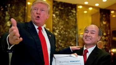 President-elect Donald Trump, accompanied by SoftBank CEO Masayoshi Son, speaks to members of the media at Trump Tower in New York, on Tuesday, Dec. 6, 2016. (AP)