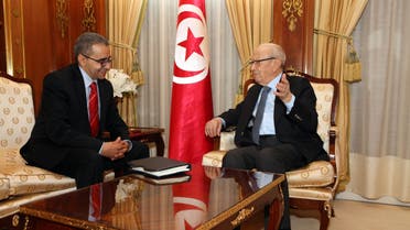 الزميل منذر بالضيافي مع الرئيس التونسي الباجي قائد السبسي