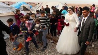 Wedding in Mosul displaced camp defies ISIS rule