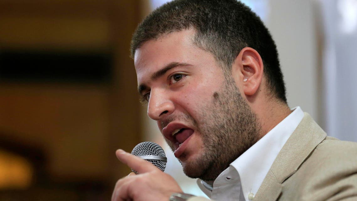 In this July 22, 2013 file photo, Osama Morsi, son of ousted Egyptian President Mohammed Morsi speaks during a press conference in Cairo, Egypt. Morsi said Sunday, Nov. 3, 2013 that the family will not attend his trial, a day before it's scheduled to start in a Cairo court. (AP)