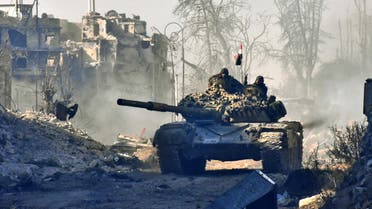 Syrian pro-government forces manoeuver a tank in the newly retaken area of Sahat al-Melh and Qasr al-Adly in Aleppo's Old City on December 8, 2016. (AFP)