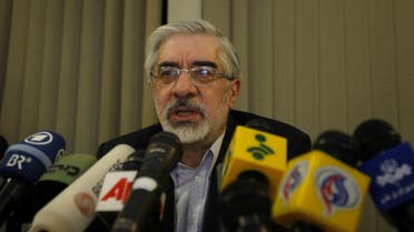 Iranian reformist presidential candidate Mir Hossein Mousavi speaks during a press briefing in Tehran following his neck-and-neck race with incumbent Mahmoud Ahmadinejad on June 12, 2009. The moderate ex-premier claimed victory in a hotly contested presidential vote in Iran while state news agency IRNA said hardline incumbent Mahmoud Ahmadinejad had won. AFP PHOTO/BEHROUZ MEHRI BEHROUZ MEHRI / AFP